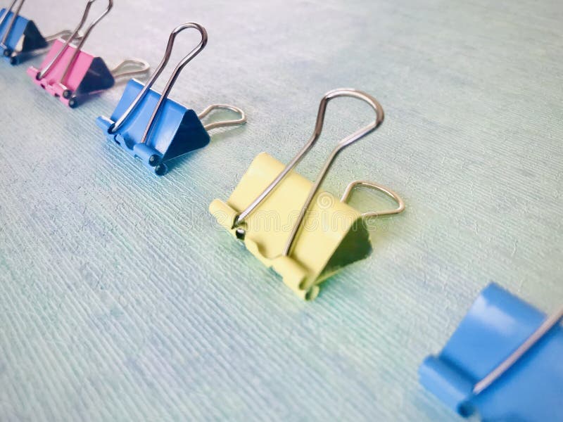 Colorful Binder Clips on a Light Blue Background Stock Photo Image of