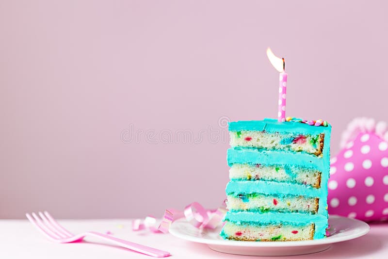 Colorful birthday cake slice with candle royalty free stock images Colorful birthday cake slice with candle royalty free stock images