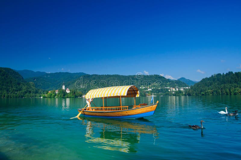 Colorful boat on Lake Bled. Slovenia stock photography