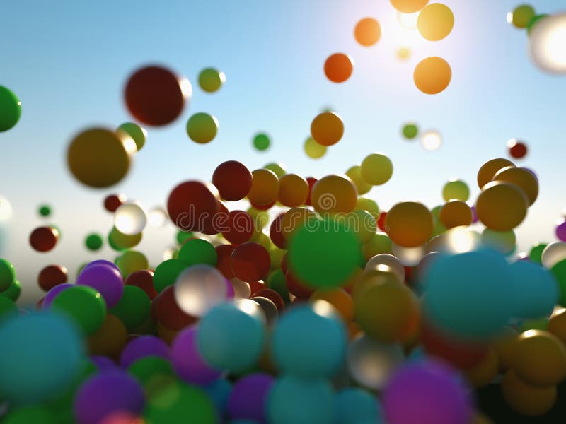 Colorful bouncing balls outdoors against blue sunny sky stock image Colorful bouncing balls outdoors against blue sunny sky stock image