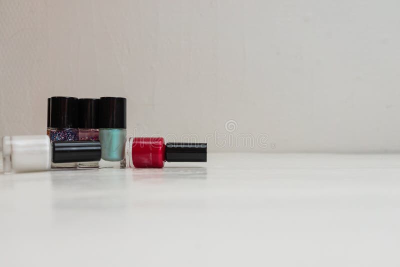 2. "Nail Polish Bottles in a Colorful Still Life" - wide 8