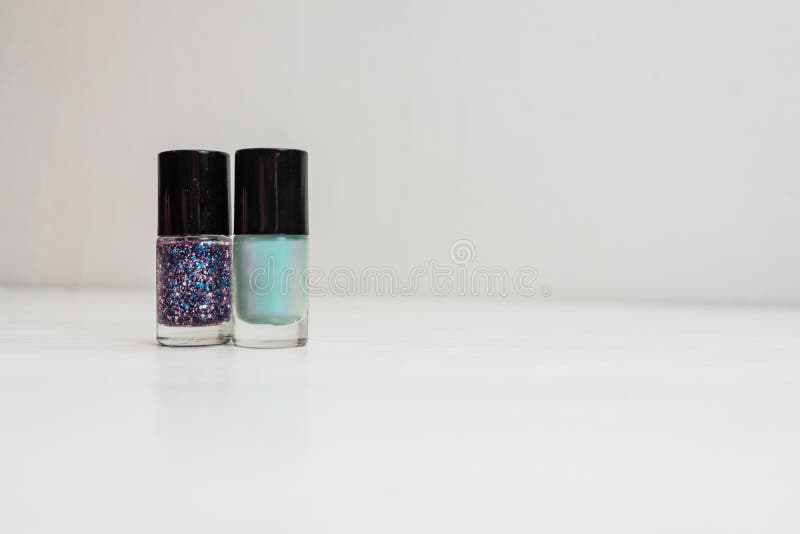 2. "Nail Polish Bottles in a Colorful Still Life" - wide 3