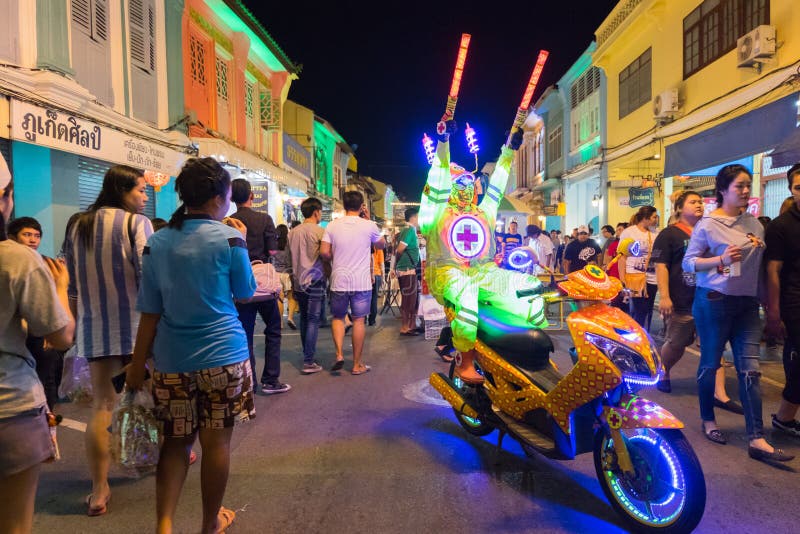 Colorful bright model on motorcycle in18th Phuket chinese new ye royalty free stock photo Colorful bright model on motorcycle in18th Phuket chinese new ye royalty free stock photo