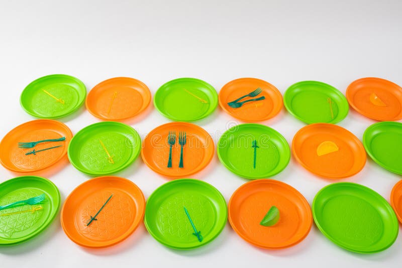 Colorful Bright Plastic Plates Setting Apart and Having Forks and