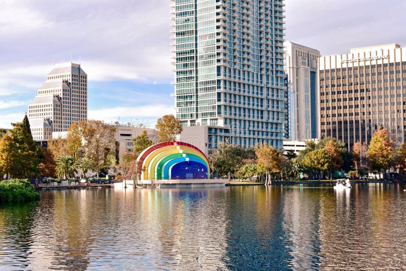Colorful buildings and autumn forest at Lake Eola Park on beautiful sunset background in Orlando Downtown area 3 royalty free stock photography Colorful buildings and autumn forest at Lake Eola Park on beautiful sunset background in Orlando Downtown area 3 royalty free stock photography