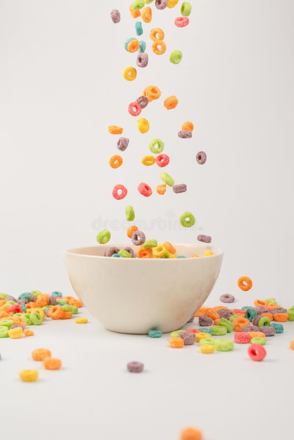 Colorful Cereal Box for Morning Breakfast. Corn Flakes Falling To the