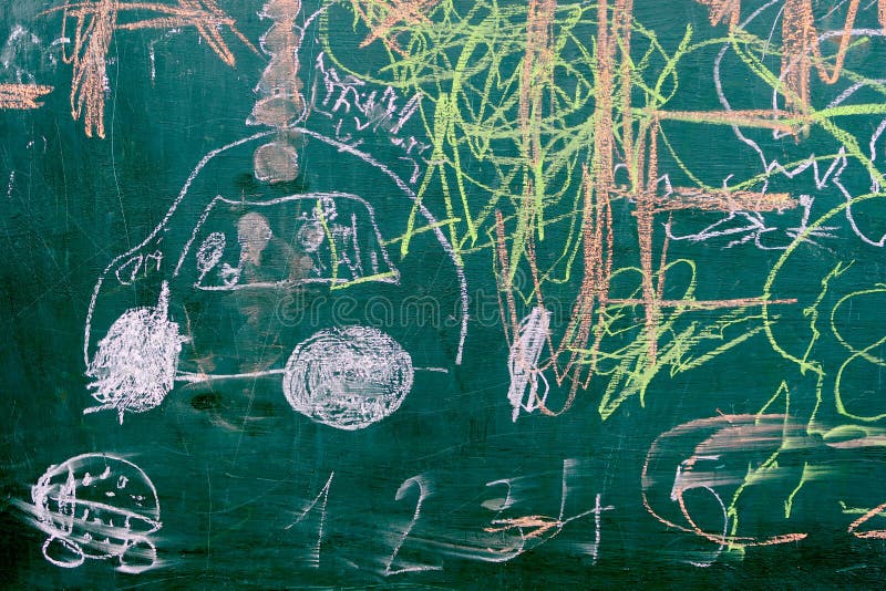Authentic colorful children`s chalk drawing on the blackboard stock images Authentic colorful children`s chalk drawing on the blackboard stock images