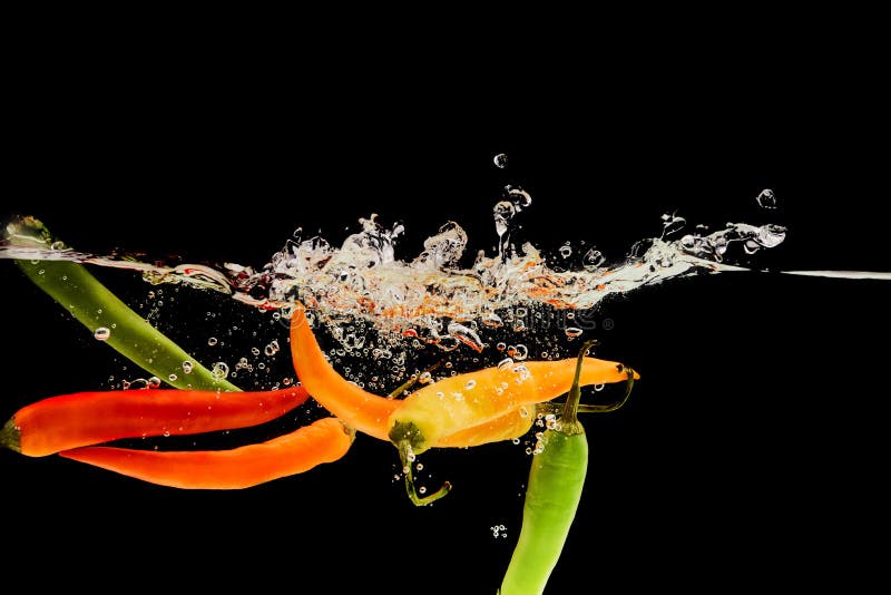 Chili Peppers Falling Water Splash Stock Photos Free & RoyaltyFree