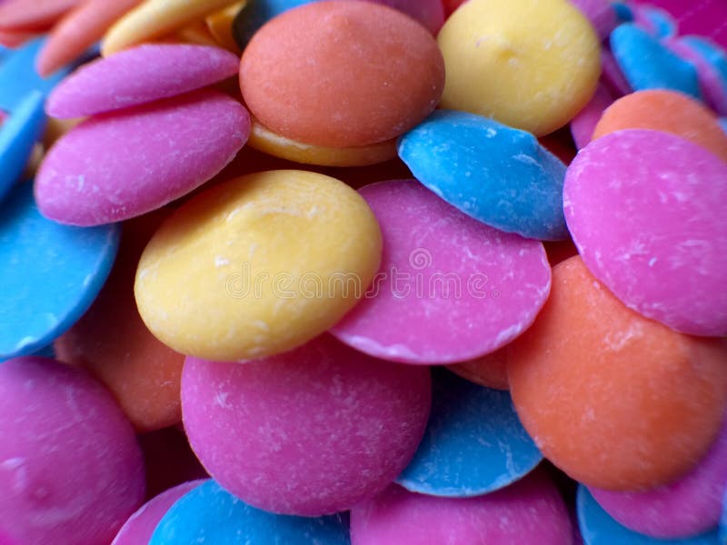 Pink Chocolate Candy Melts On Pink Polka Dots Background Stock Image