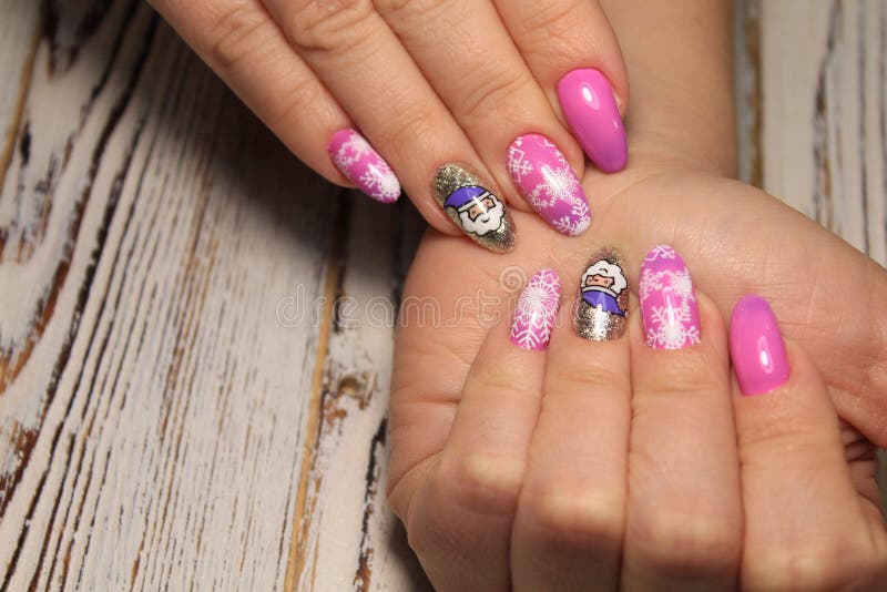 Nail design . Manicure nail paint . beautiful female hand with colorful nail  art design manicure Stock Photo by ©elena1110 112162730