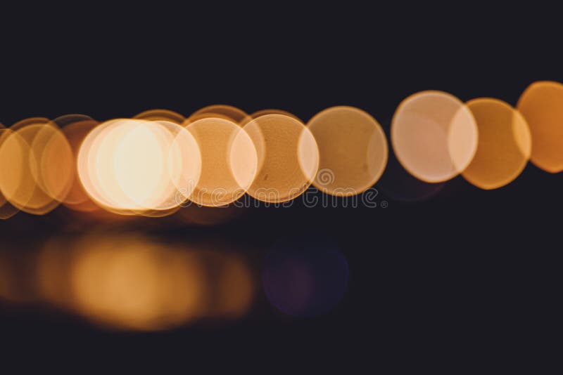 Colorful city lights with bokeh effect reflected over sea background at dusk stock photography Colorful city lights with bokeh effect reflected over sea background at dusk stock photography
