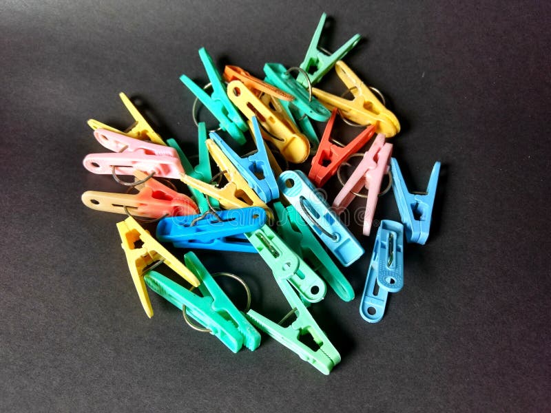 Colorful clothespins with black background royalty free stock image Colorful clothespins with black background royalty free stock image