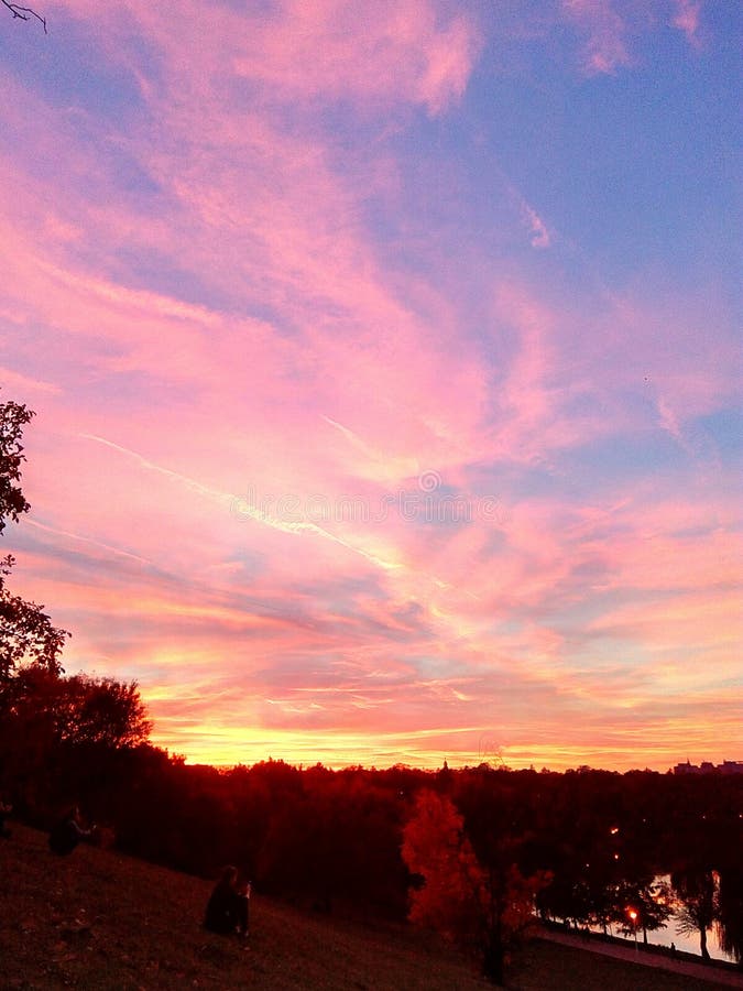 Colorful clouds at sunset stock photos