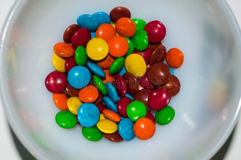 Colorful coated chocolate candies in a white bowl. royalty free stock photo Colorful coated chocolate candies in a white bowl. royalty free stock photo