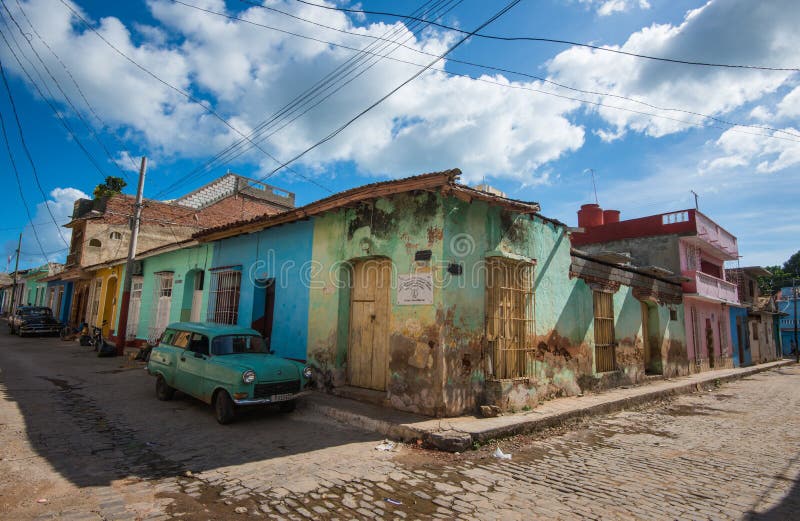 Colorful Caribbean aged village with cobblestone street, classic car and Colonial architecture, Trinidad, Cuba, America. royalty free stock images Colorful Caribbean aged village with cobblestone street, classic car and Colonial architecture, Trinidad, Cuba, America. royalty free stock images