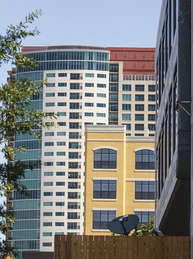 Low rise and high rise condo buildings in a mixed use development. Low rise and high rise condo buildings in a mixed use development