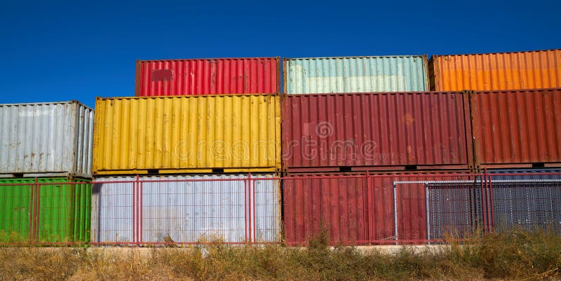 Colorful containers storage shipping container in a row stacked