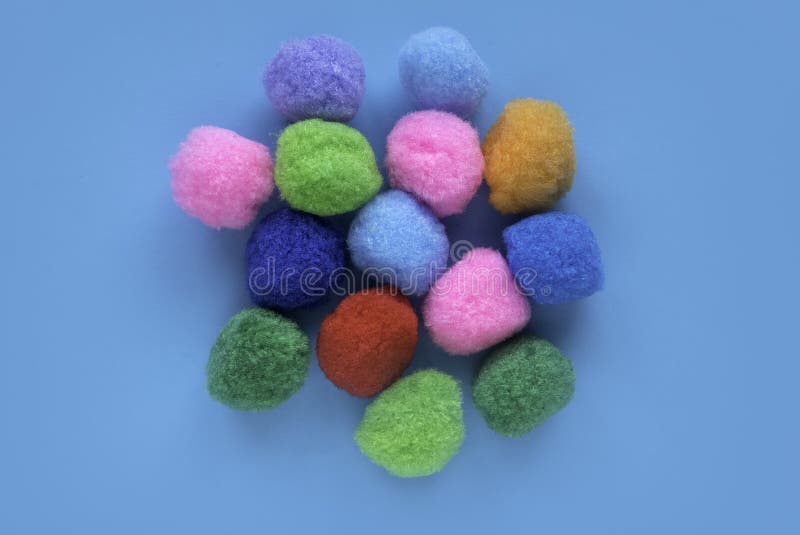 Colorful Cotton Balls on Blue Background Stock Photo - Image of