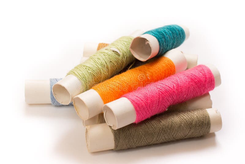 Colorful Cotton Yarns on Rolls for Sewing. Thread Spools Used in Fabric