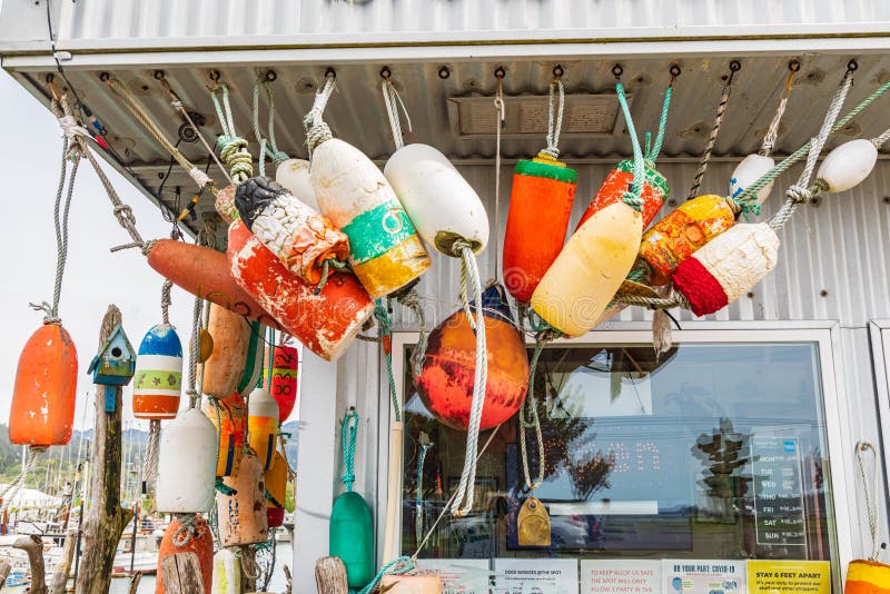 Colorful Crab Trap Floats Hanging Outside a Shop in Garibaldi, Oregon  Editorial Photography - Image of oregon, crab: 228909992