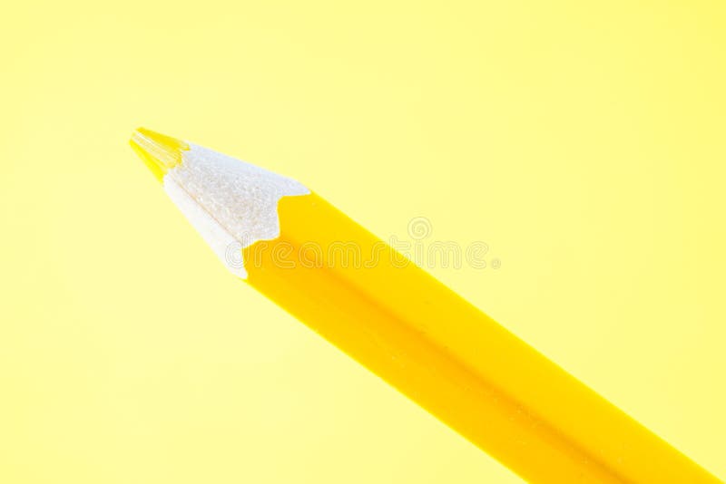 Colorful crayons, pencils with plain paper as a background with structure royalty free stock photos