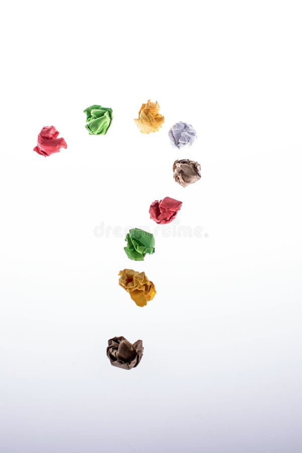 Colorful crumpled paper form a question mark stock photos
