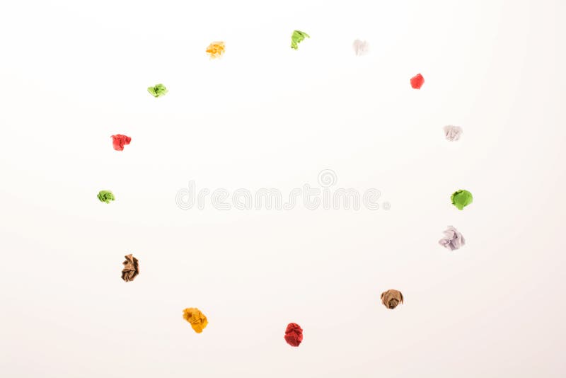 Colorful crumpled papers form a round shape royalty free stock photo