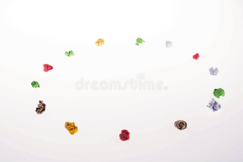 Colorful crumpled papers form a round shape royalty free stock photo