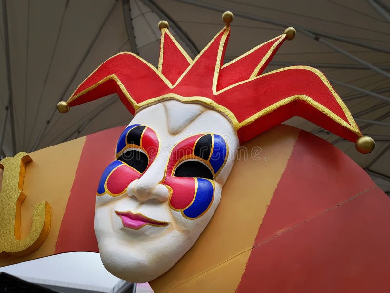 Colorful Decorative Clown Mask at the Entrance of Carnival. Colorful Decorative Clown Mask at the Entrance of Carnival