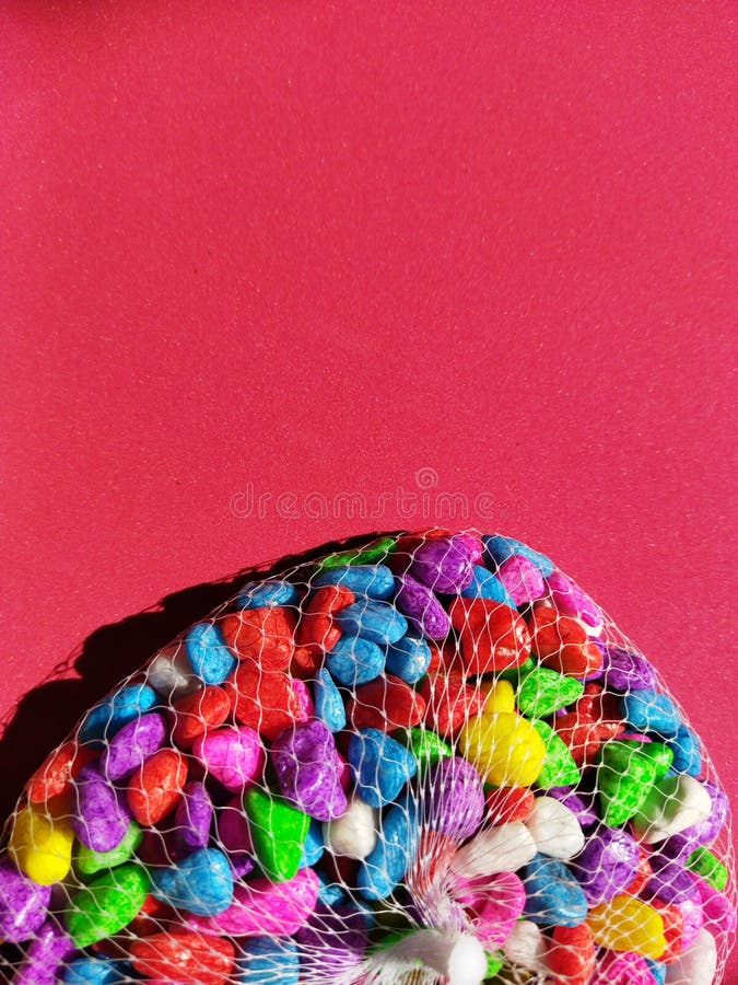 Colorful Decorative Stones on a Red Background Stock Photo Image of