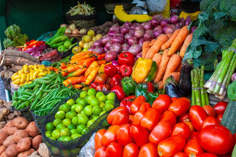 Colorful display of the variety fruits and vegetables on the market stand