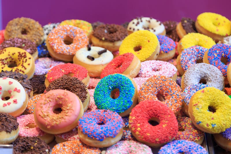https://thumbs.dreamstime.com/b/colorful-donuts-assortiment-various-colors-toppings-51578396.jpg