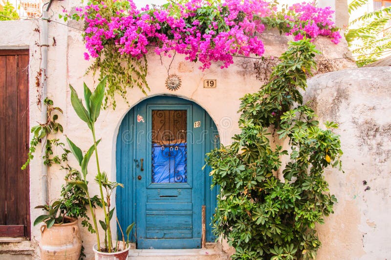 Colorful House Door Surrounded by Flowers. City S Detail of ...