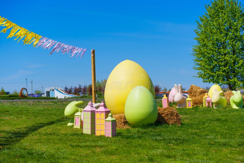 Colorful Easter Egg Decorations in a Spring Park Setting stock photos