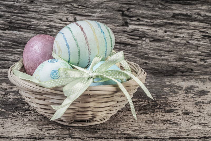 Colorful easter eggs in a basket