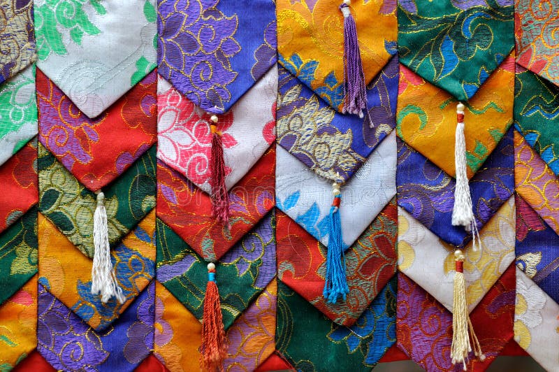 Colorful fabric decoration in Tibet style stock photos