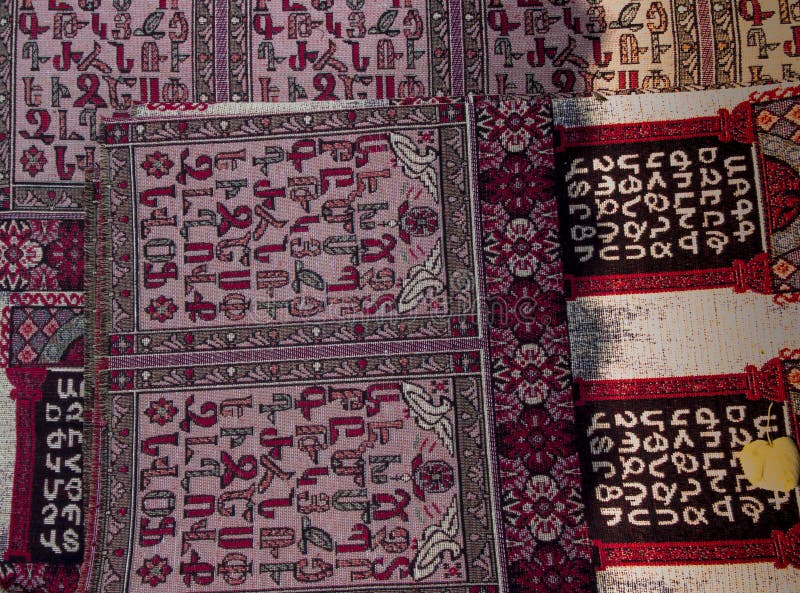 Colorful fabrics and other folk products at a roadside stall wit. H traditional Armenian colors and patterns as a background stock photography Colorful fabrics and other folk products at a roadside stall wit. H traditional Armenian colors and patterns as a background stock photography