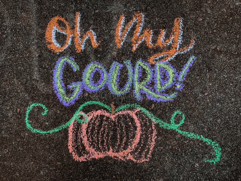 Colorful fall-themed chalk art on a driveway that says, `Oh my gourd!` with a pumpkin underneath. Play on words of `Oh my gosh!` or `Oh my God!`. Colorful fall-themed chalk art on a driveway that says, `Oh my gourd!` with a pumpkin underneath. Play on words of `Oh my gosh!` or `Oh my God!`.