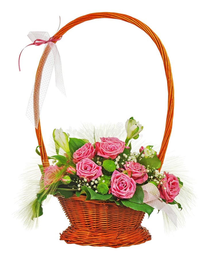 Colorful flower bouquet from roses in wicker basket isolated on