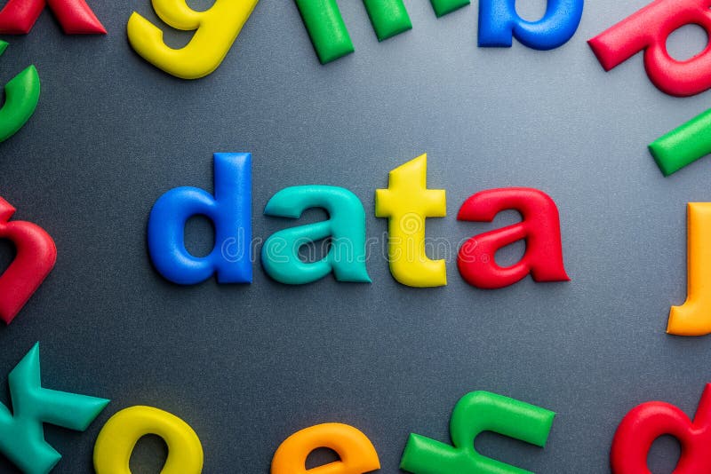 Colorful foam letters forming DATA with surrounding playful letters stock photography