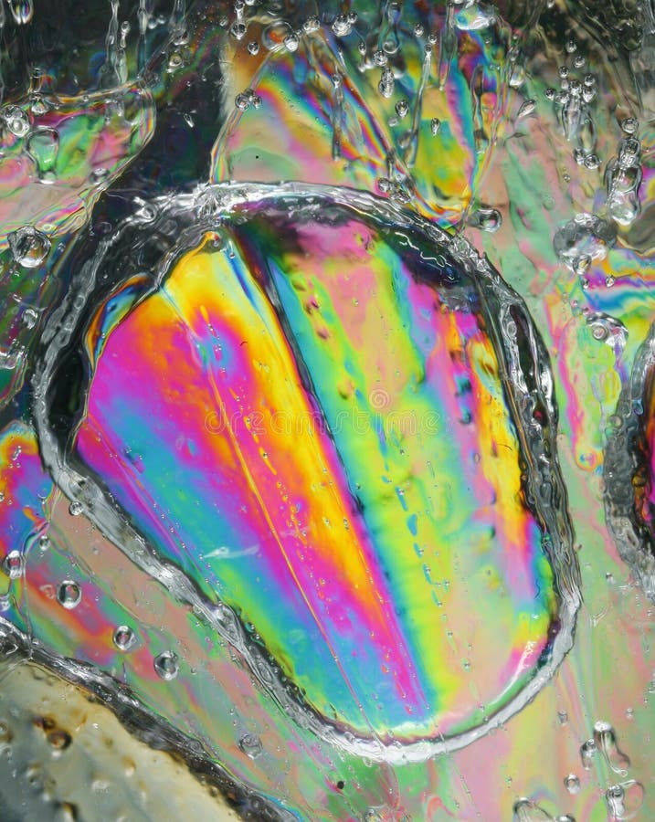 Colorful frozen drop of water royalty free stock photography