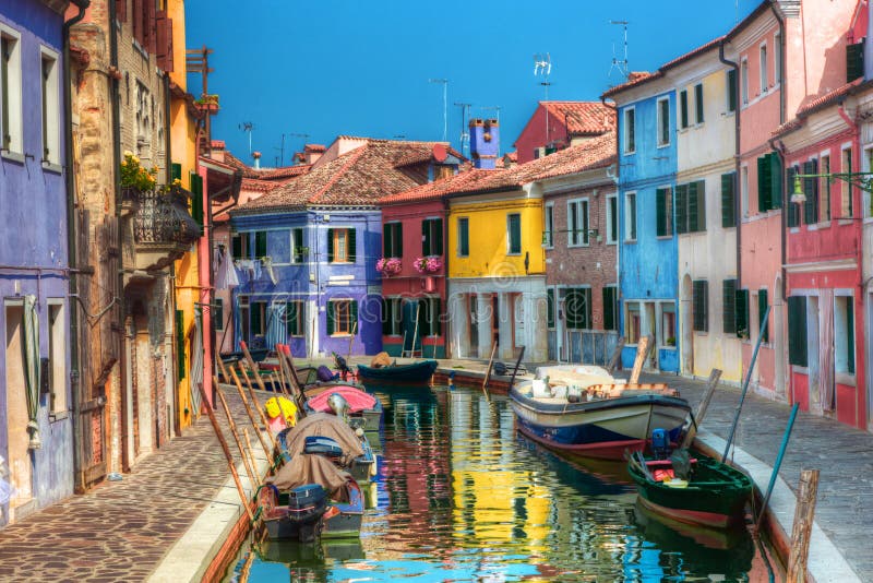 Colorful houses and canal on Burano island, near Venice, Italy.