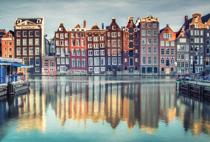 Colorful houses in Amsterdam, Netherlands at sunset