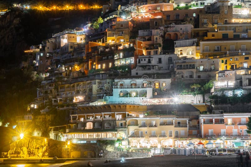 Colorful houses of Positano along Amalfi coast at night, Italy. Night landscape. Travel