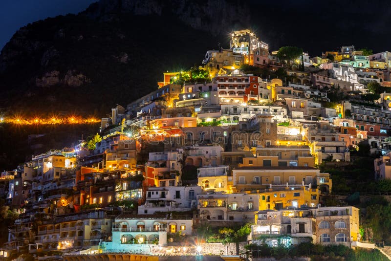 Colorful houses of Positano along Amalfi coast at night, Italy. Travel