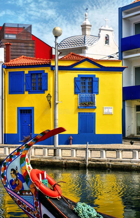 Colorful houses and typical boats in Aveiro stock photo Colorful houses and typical boats in Aveiro stock photo