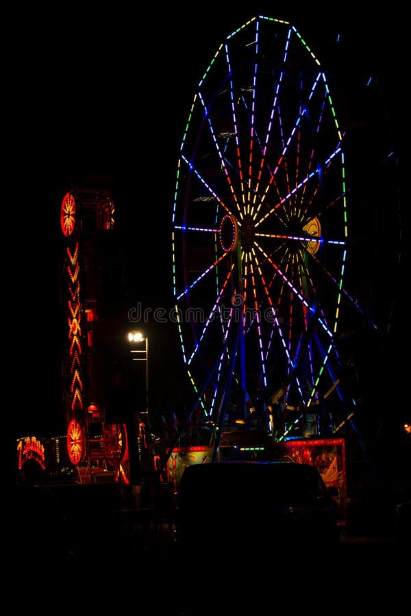 Colorful July 4th Ferris Wheel and Carnival at Night