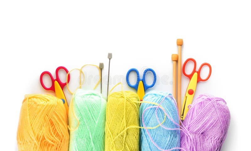 Colorful Knitting Yarn With Needles And Scissors On White