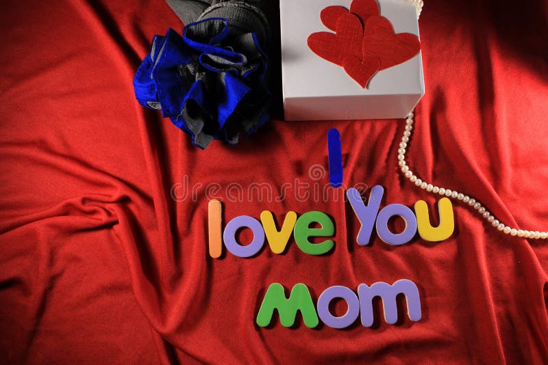 Colorful Letters with I Love You Mom Isolated on Red Cloth Background. I  Love You Mom Spelled with Colorful Letters and Red Heart. Stock Image -  Image of expression, arrangement: 182205493