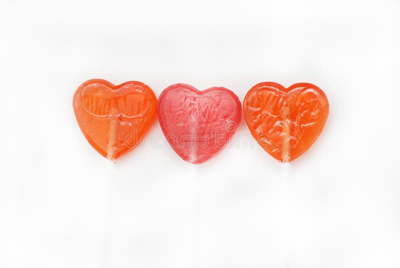 Colorful lollipops Heart Shape on dark background. Top view. Love and Valentine& x27;s Day Concept. Colorful lollipops Heart Shape on dark background. Top view. Love and Valentine& x27;s Day Concept.